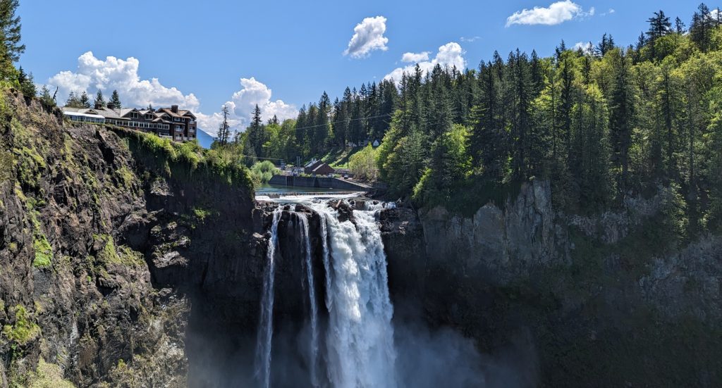 Waterfall beween two peaks suggests balance in motion